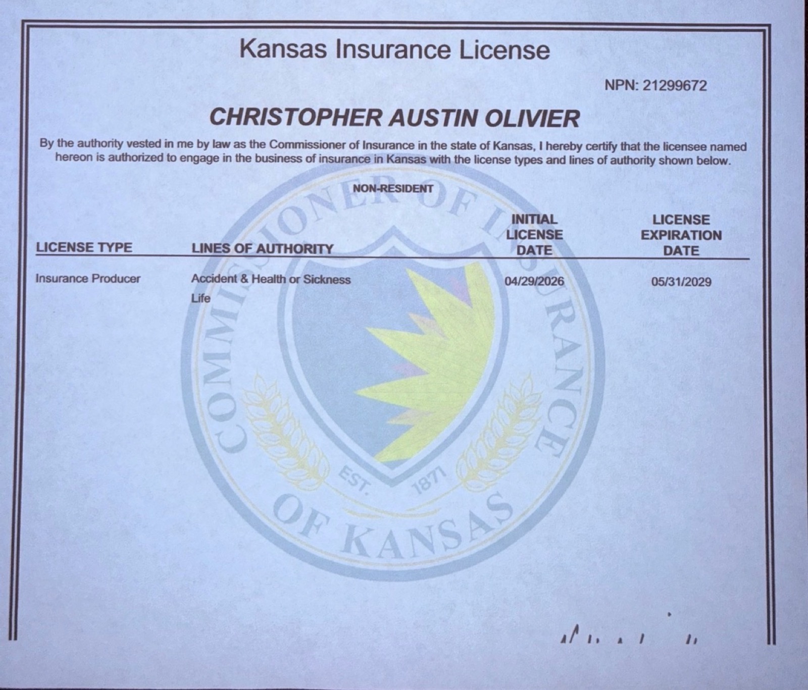 Redacted Kansas insurance producer license certificate for Christopher A. Olivier, NPN 21299672